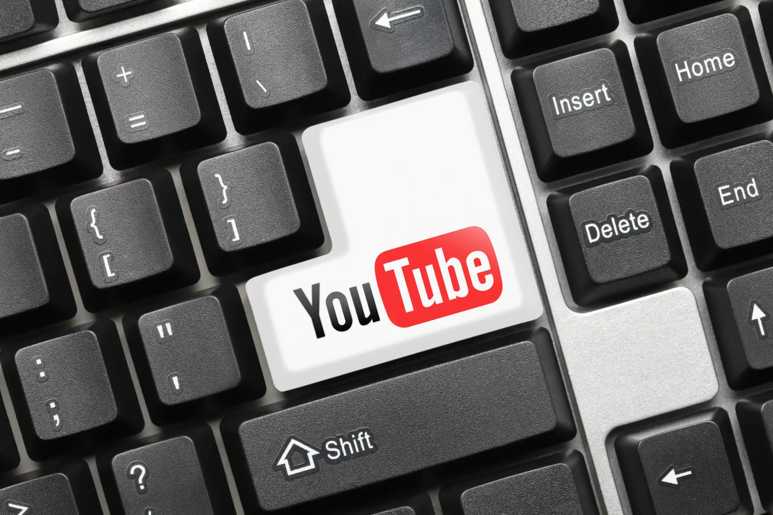 Keyboard with YouTube logo.